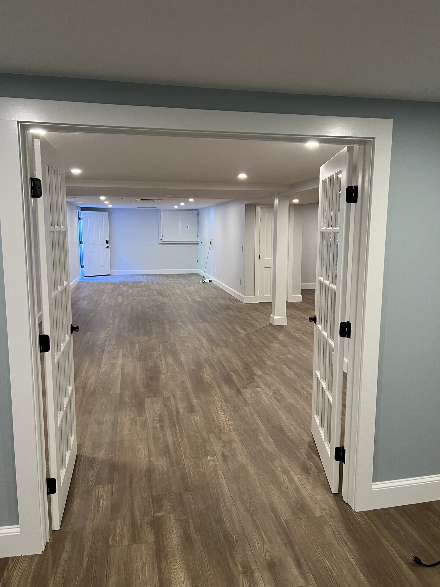 Basement Lounge with Custom Millwork in MetroWest, MA