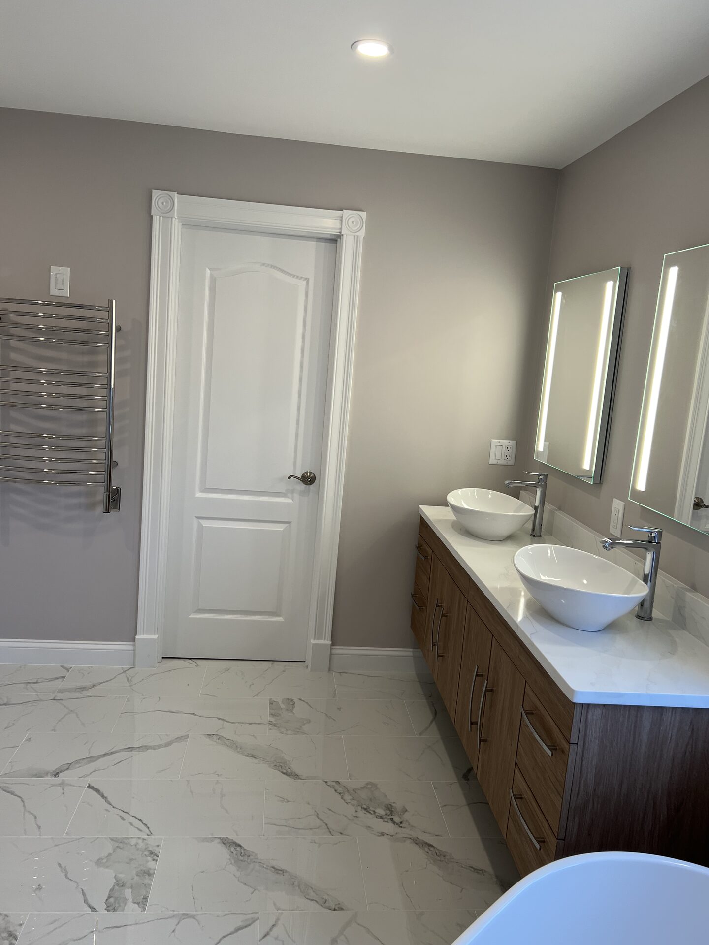 Heated Towel Rail & Custom Trim Detail in Holliston, MA