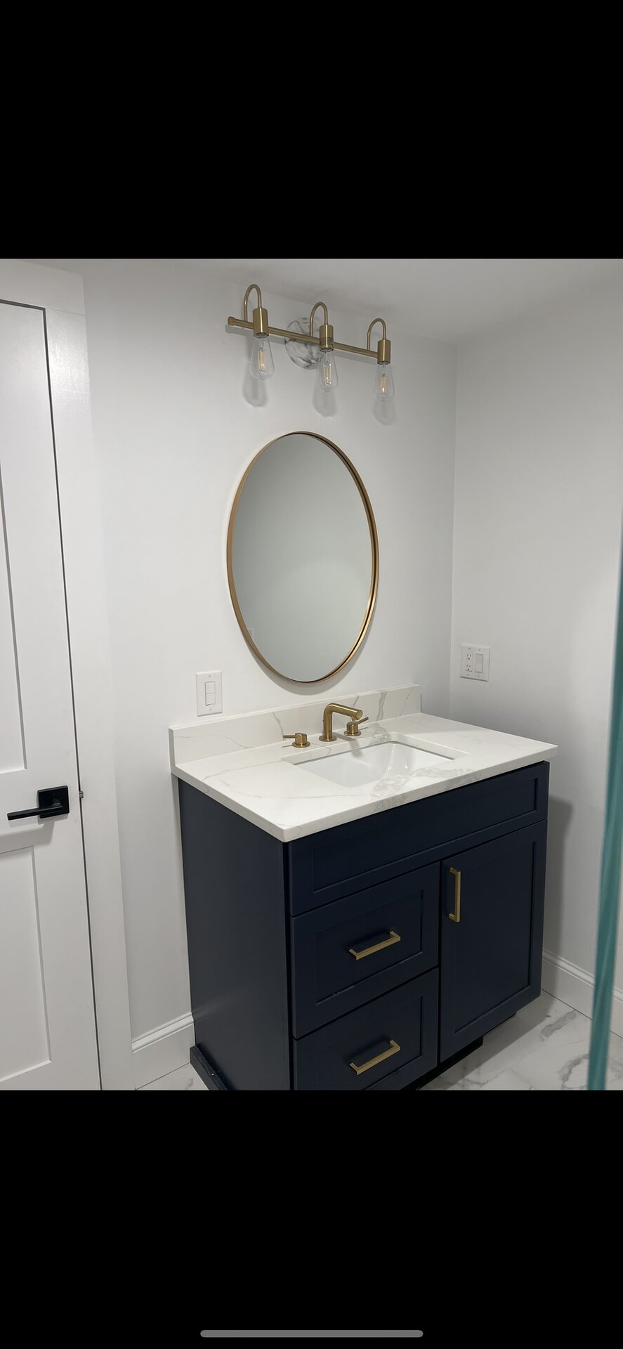 Spa Bathroom with Marble-Look Tile in Wellesley, MA