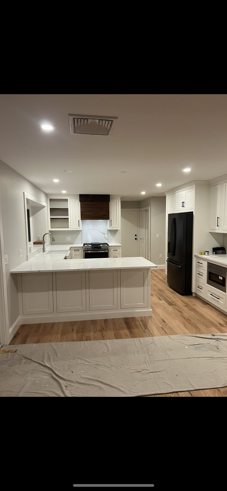 Two-Tone Kitchen with Navy Perimeter Cabinets in MetroWest, MA
